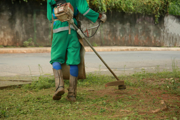 Worker using a cutter tool